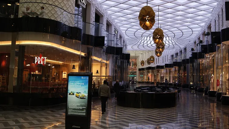 The lattice glass roof and lanterns inside Victoria Gate